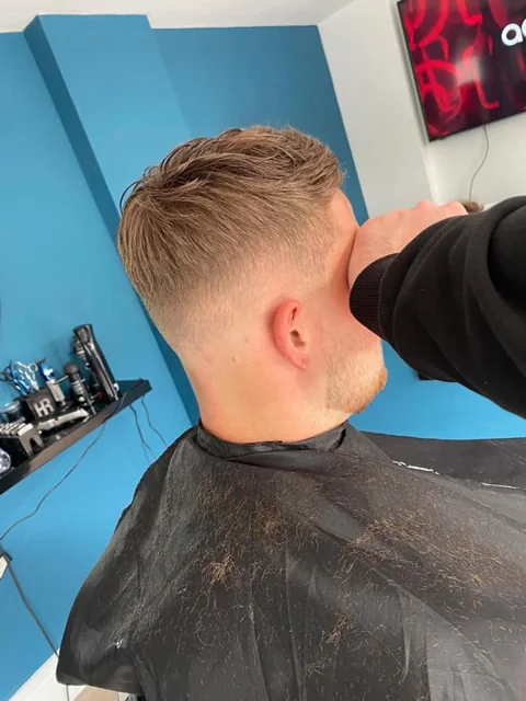 A close fade and sharp hairline created at RAGE