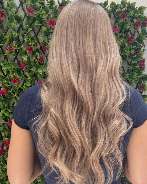 Long brunette hair with soft waves and lighter ends